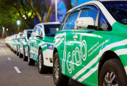Kuala Lumpur Guide - E-hailing car with visible branding, offering reliable and insured transport.