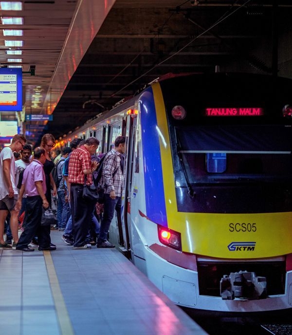 Kuala Lumpur Guide - KTM Komuter train with a crowded of passengers in Malaysia.